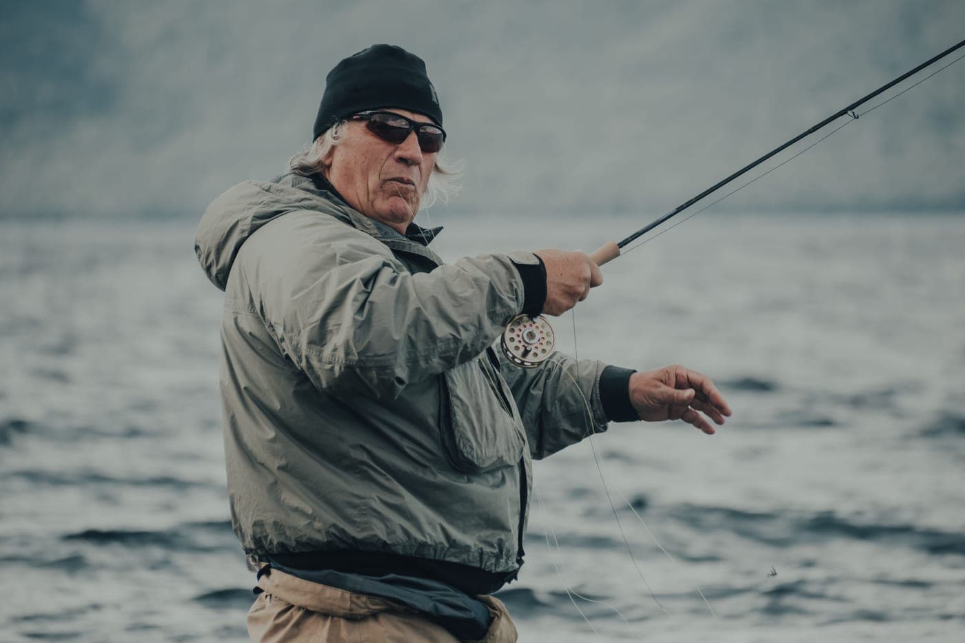 An angler on the water in polarized sunglasses